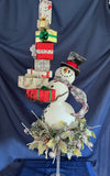 Snowman Carrying Presents