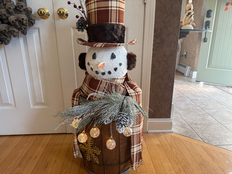 Snowman on a Whiskey Barrel