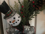 New England Evergreens with snowman