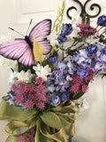 Lilacs and a pink butterfly