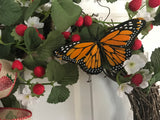 Strawberries and a Butterfly