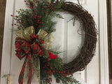 24” Grapevine wreath/evergreens