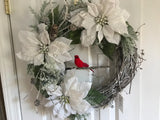 Three Snow Covered Poinsettias