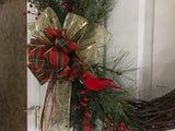 24” Grapevine wreath/evergreens