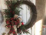 24” Grapevine wreath/evergreens