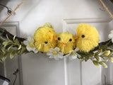 Three Baby Chicks Swinging