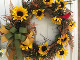 Sunflowers and a Cardinal