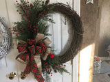 24” Grapevine wreath/evergreens