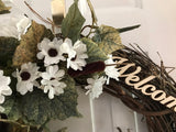 Cattails and small White Sunflowers