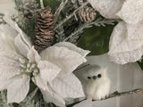 Three Snow Covered Poinsettias