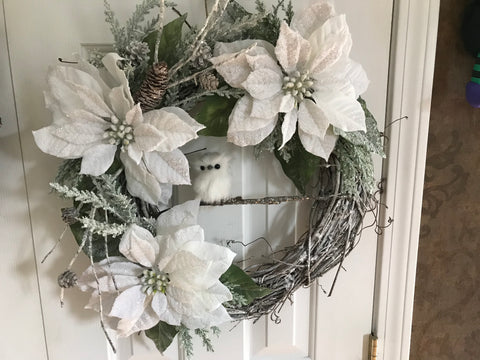 Three Snow Covered Poinsettias